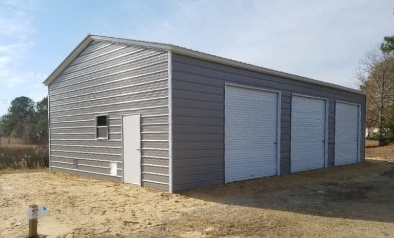 Metal workshop with walk-in door and windows